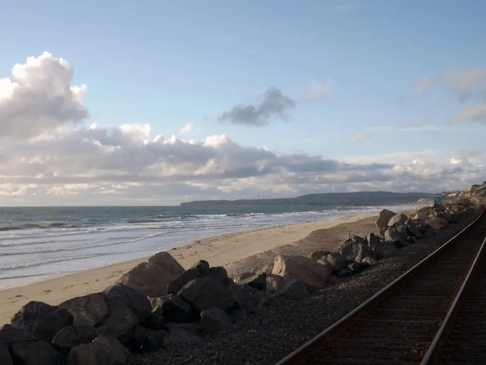 Calafia Beach at San Clemente State Beach with the coastline running past the rail line