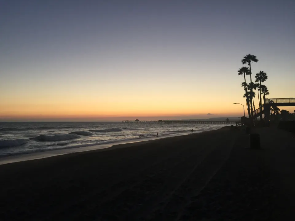 Sunset at T-Street Beach in San Clemente with the pier in the distance